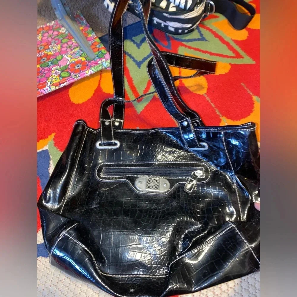 Black faux leather purse​​​